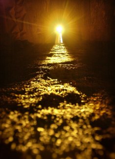 the light at the end of the tunnel. {Brugh Na Boinne -Eire- Nollaig = Newgrange Solstice 2003 Ireland.