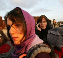 Treasa N Cheannabhin (56) and her daughter, Naisrin Elsafty (19), waiting to cross back into Egypt yesterday (photo/caption: The Irish Times)