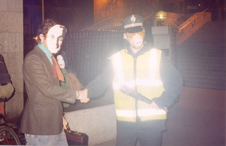 Bertie Ahern shakes hands with the Garda.