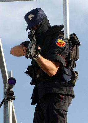 italian man blurs soldier with policeman at the G8 in Italy 2001