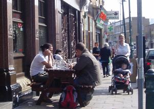 Cafe society, cockney style 500 metres from the cordoned off Hackney Road