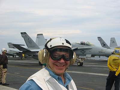 Tom Tancredo poses on the USS Ronald Reagan