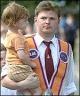 a established orange daddy with wee bairn orange kid keep it proud and traditional.