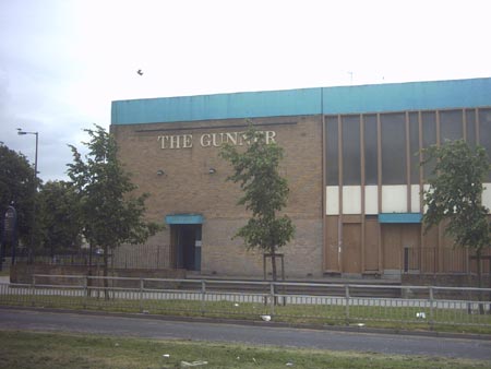 The Gunner. Local, friendly, windowless, "monitored by CCTV" public house.