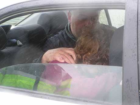 Willie Corduff comfoting his distressed wife Mary, who received medical attention for the stress today and yesterday