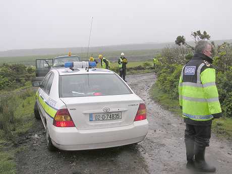 The Gardai on the scene, transporting Mary Corduff to the doctor in Belmullet, some 20 miles away