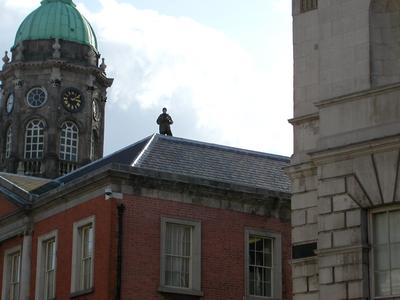 Armed guard on roof