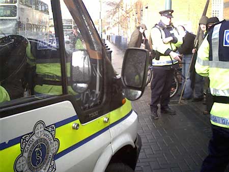 Garda van pushes its way through the blockade onto the forecourt.