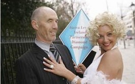 Martin Rowan, Secretary, Sierra Leone Ireland Partnership(SLIP) with Marilyn Monroe look-alike Tracey McCracken at the launch of the SLIP Diamond Awareness Campaign on St Valentine's Day 2005