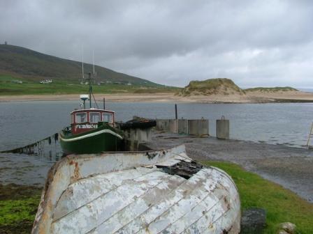 The pier in Rossport, the dune on the other side of the water is one of the very particular machairs, unique to the north west of Ireland and the north west of Scotland, the pipeline is landing on that side of the estuary and then crossing over.