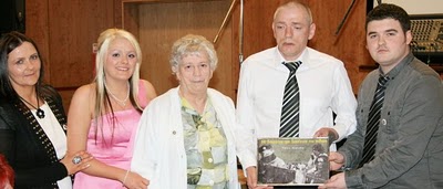 Barry McColgan making presentation to family of Paula Murphy