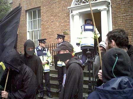 Demonstrators outside the embassy (faces blacked out on request)