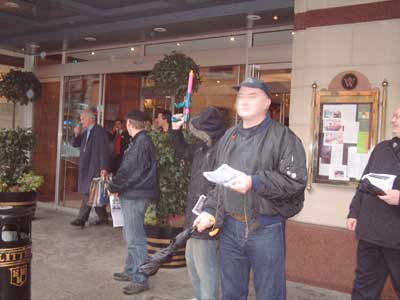 Leafletting outside hotel