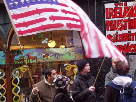 Activists doing their stuff outside Lynch's castle in Shop St.