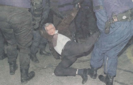 Joe Higgins being 'lovingly treated' by Gardai at an anti-war demo