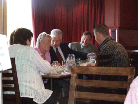 Chairman of Louth County Community and Voluntary Forum, Benny Devlin, Togher, Dunleer, has a word in Lucy Rafferty's ear during lunch of soup and sandwiches at the open space day in The Fairways Hotel.