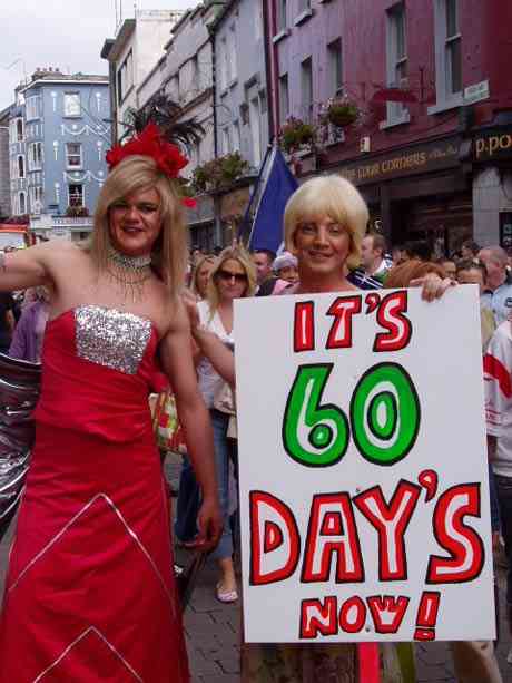 Members of Galway's gay community breaking their stride at the Gay Pride march through Shop Street to bear witness. Alright Gays, much appreciated !.