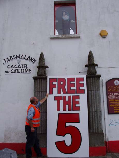 The Black Beast called Shell safely caged in Galway City's museum. Up above, the luminous feet of Madonna and Child crushing its head. Down below, Padraig Cambell, making sure the fucker does'nt bolt before the righteous task is completed and, let it be s