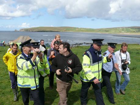 Gardai being escorted off site