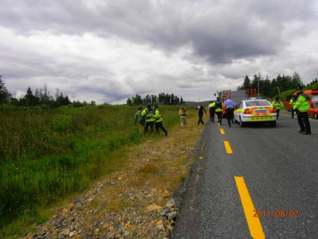 the person to the left being arrested on private land