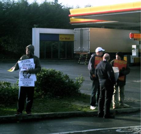 A CYM comrade leafleting