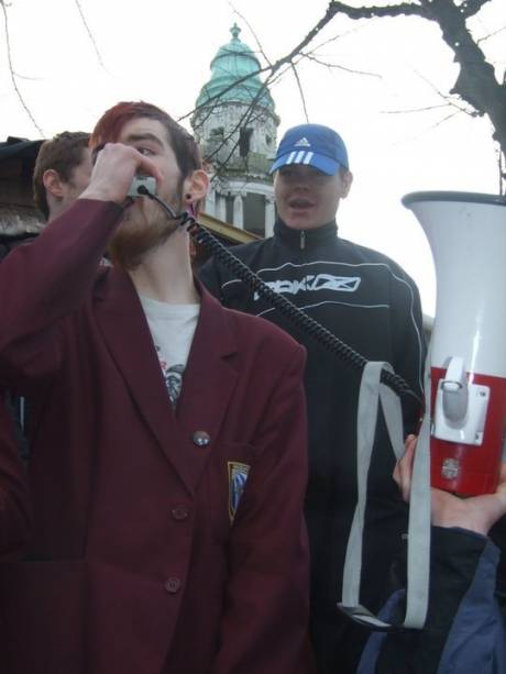 Simon McConville addressing the crowd at the protest against increased tuition fees and scrappage of EMA in Belfast