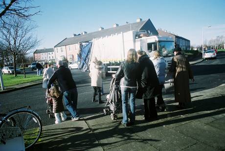 The lorry arrives.