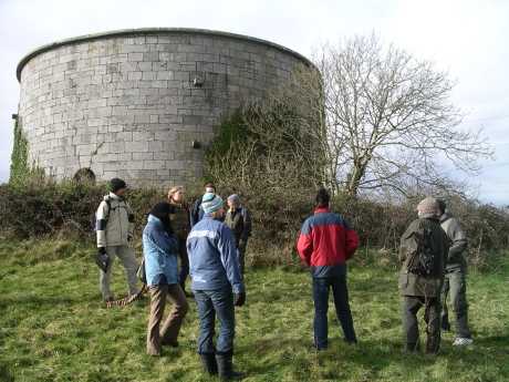 Brief discussion, with Martello Tower in background