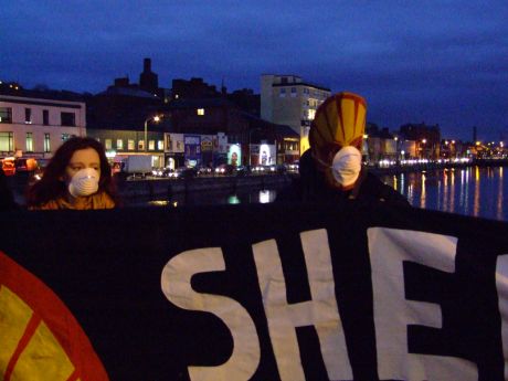 More masked faces at our protest.