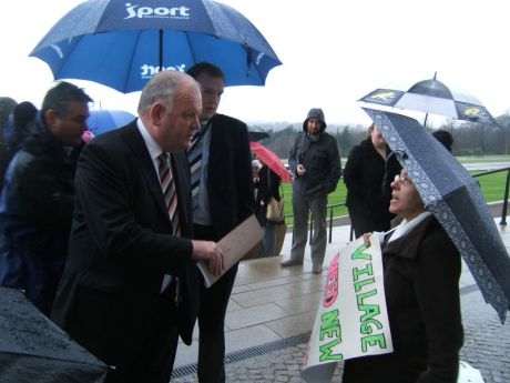 Jimmy Spratt challenged by Village women