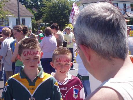 Danny conversing with two young lads