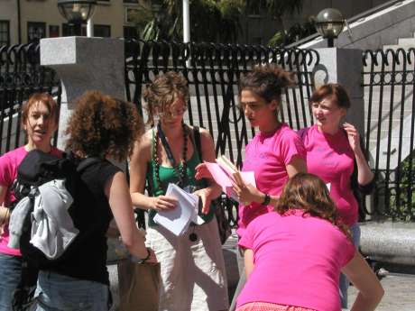 A few members of Choice Ireland talk to people in attendance. The stall had badges, shirts and books on sale to raise funds for the campaign.