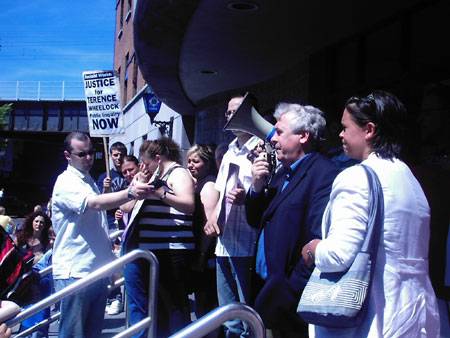 Joe Costello talking to the crowd