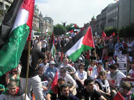 People enjoy the sunshine and the speeches