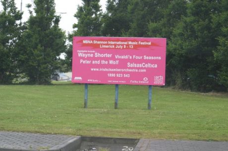 Sign on the same roundabout from whch Council removed LCMEJP sign. A distraction to traffic? Overlaying a Council road traffic sign. 