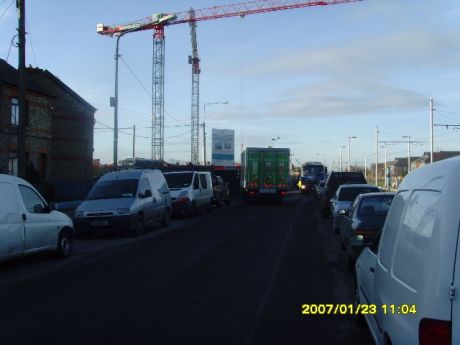 CONSTRUCTION TRAFFIC AND PARKING CAUSE PEDESTRIAN HAZARDS