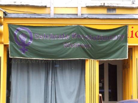 The 'Celebrate Revolutionary Women' banner on display outside Solidarity Books