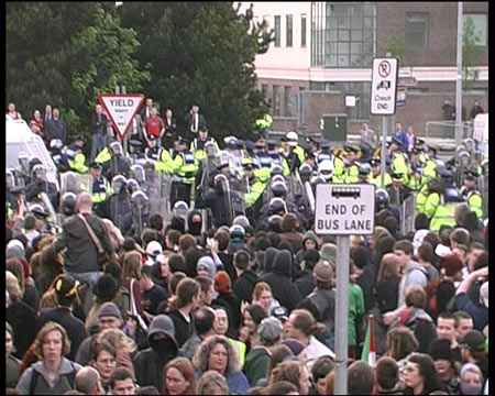 Riot police replace uniforms and launch baton charge