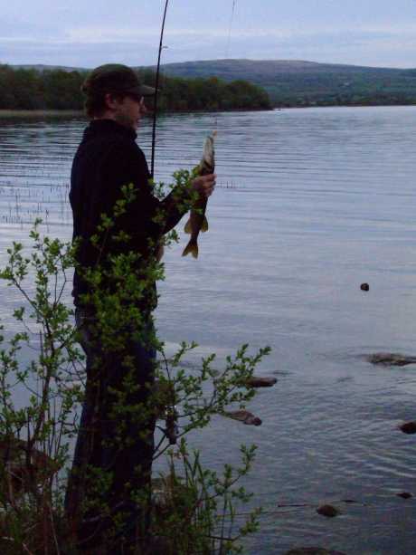 Peter Gowran hooks a pike.