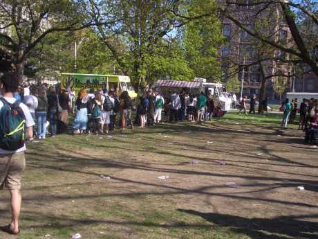 A Very Happy Food Vendor in The Distance