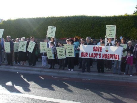 Crowd gather outside the hospital