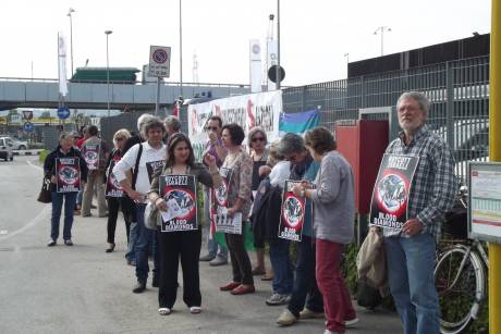 Human Rights activists protest about the trade in Israeli blood diamonds outside the World Diamond Council meeting in Vicenza, Italy on Monday