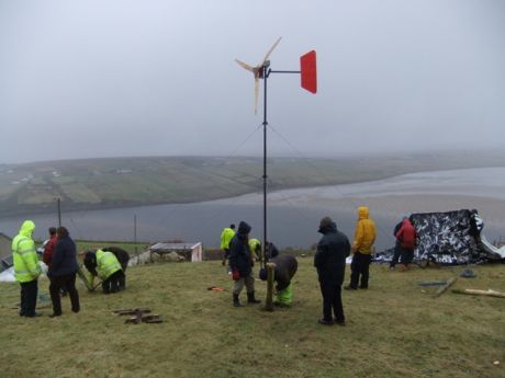 Putting up the wind turbine