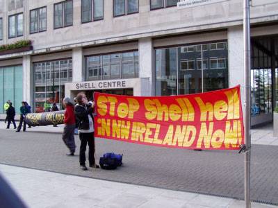 protest at front of building (outside government exclusion zone)