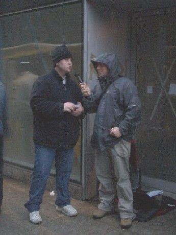 glen does a radio interview on moore st.