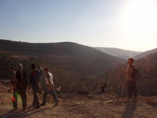 Bare hilltop unadorned by settlement - bizarre