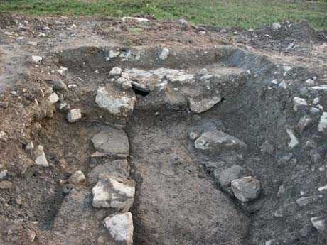 Picture of the Souterrain from the site which is now nothing but a pile of stones at the entrance to the site