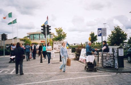 June Kelly, a member of the Westmeath Anti-War Group doing her stuff outside the Golden Island Shopping Centre in Athlone.