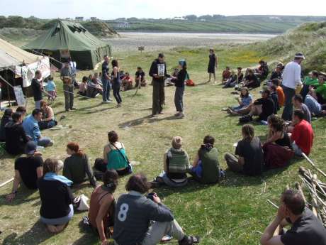 Morning meeting at recent gathering at the camp.