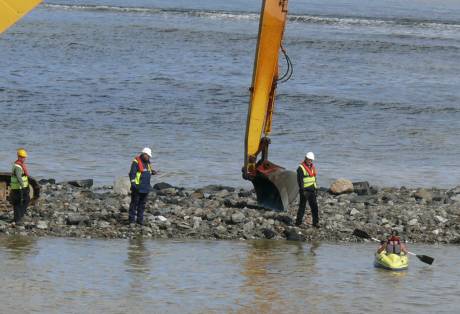 Action starts with solitary kayaker entering dredging area